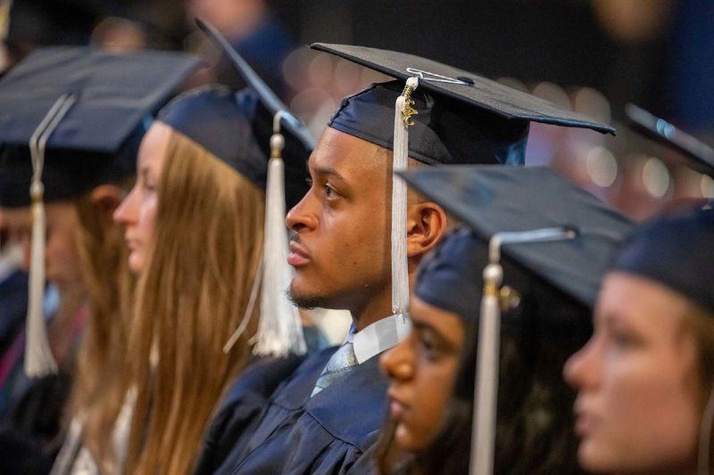 Students listen to a speaker during Penn State Behrend's spring commencement program.